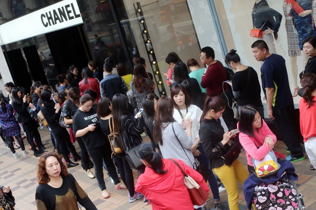 Shoppers and tourists flocked to Chanel stores in Hong Kong last Friday as the luxury brand slashed prices of its classic bags by almost 20 per cent. Photo: David Wong