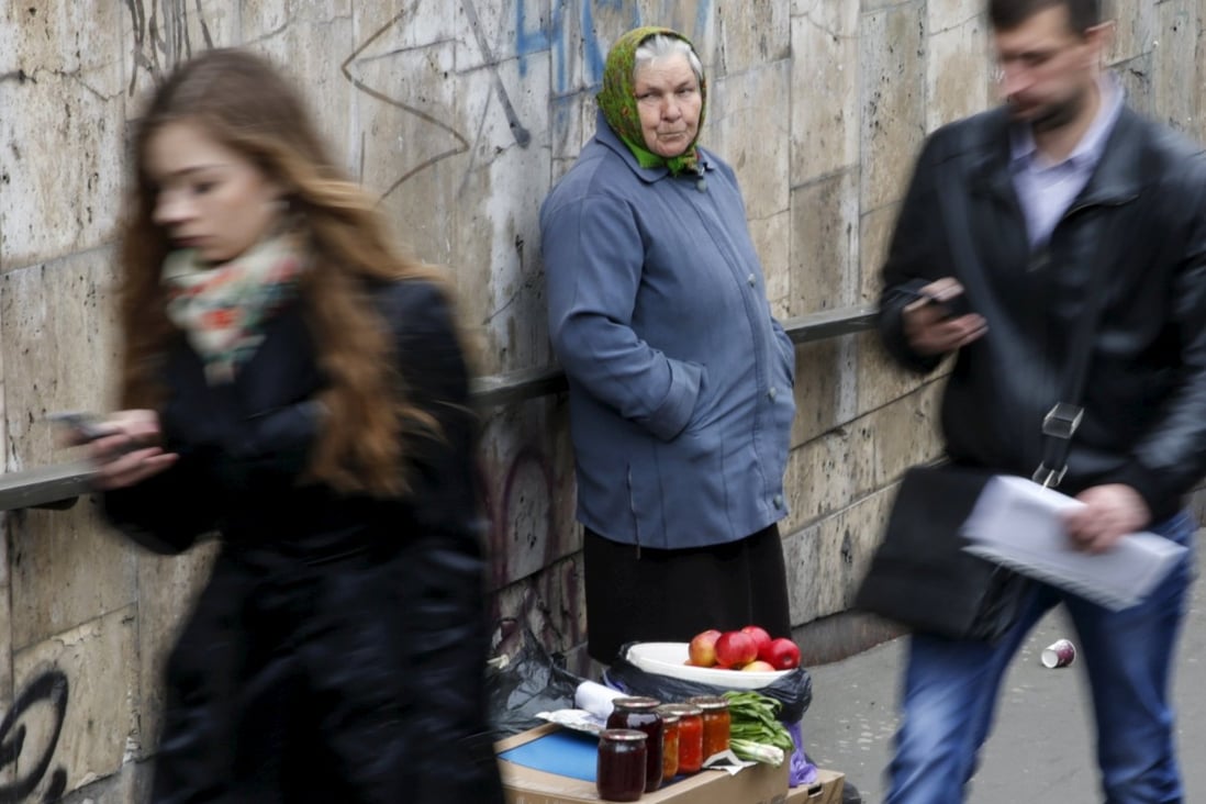 A vendor selling fruit and home-made food in Kiev. The economy in Ukraine is in deep crisis, and things are getting worse. Photo: Reuters