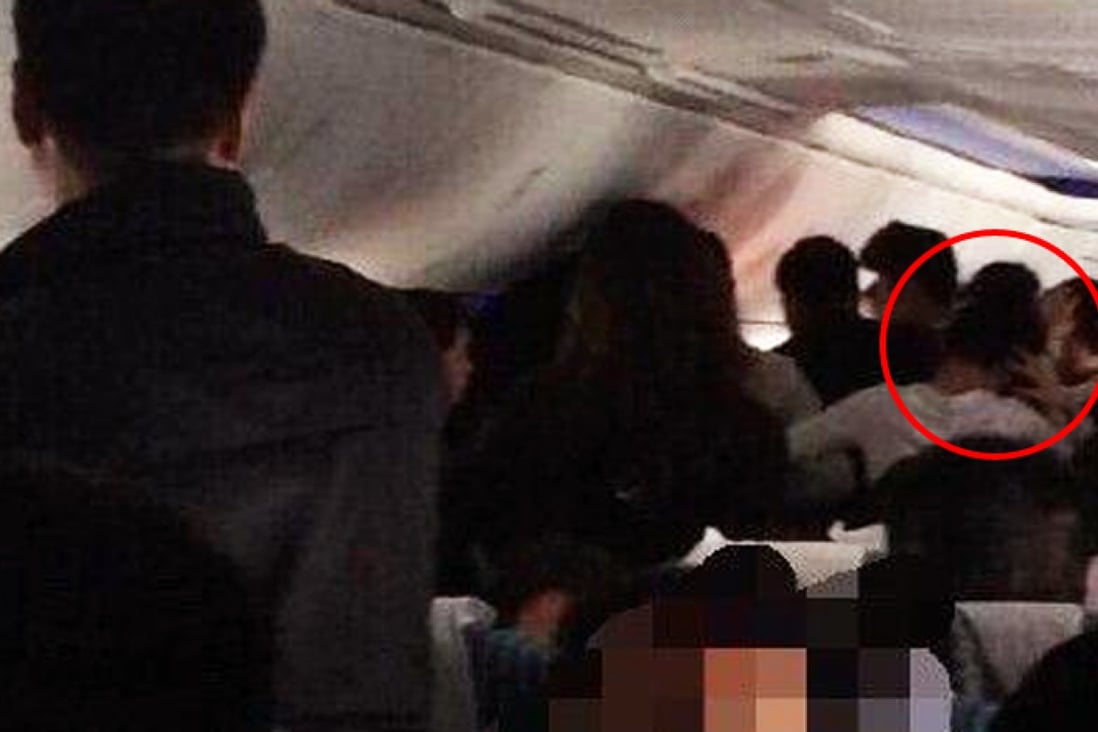 A photograph taken by a passenger shows the women  allegedly fighting one another during the flight. Photo: SCMP Pictures