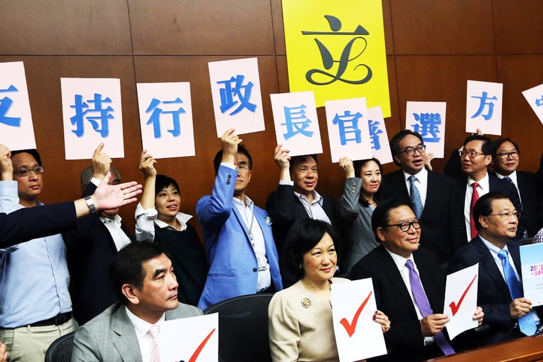 Rival lawmakers give their verdict on the proposals. Photo: Sam Tsang