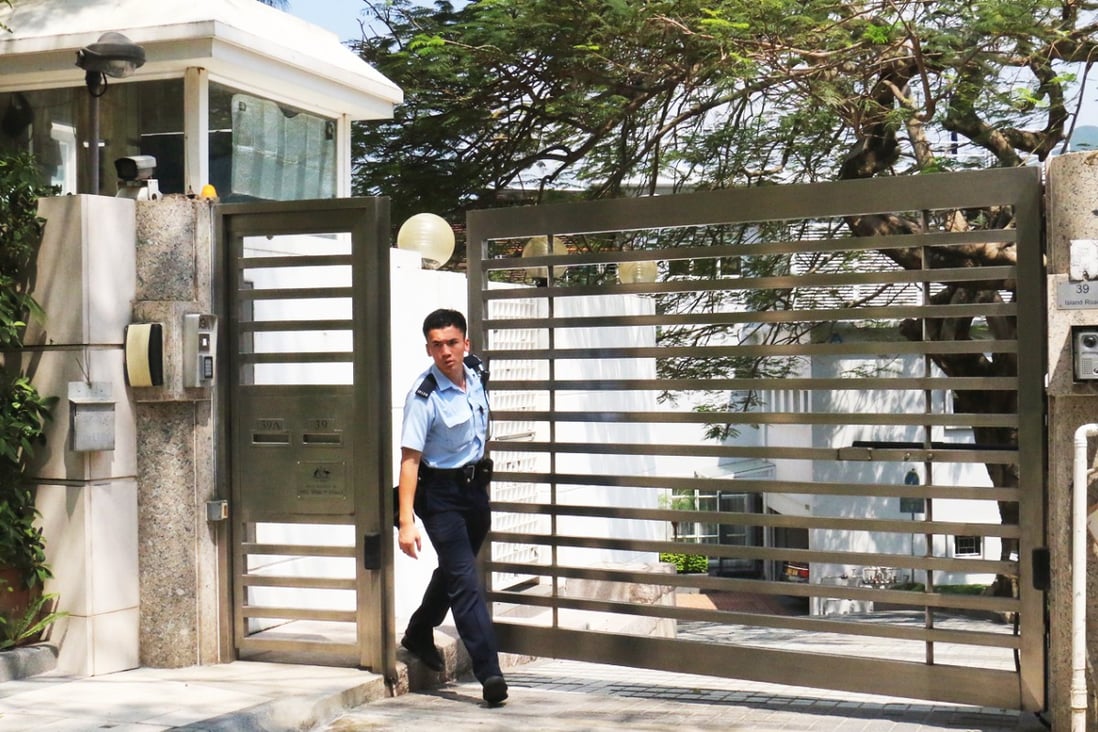 A policeman outside the consul's residence.Photo: SCMP Pictures