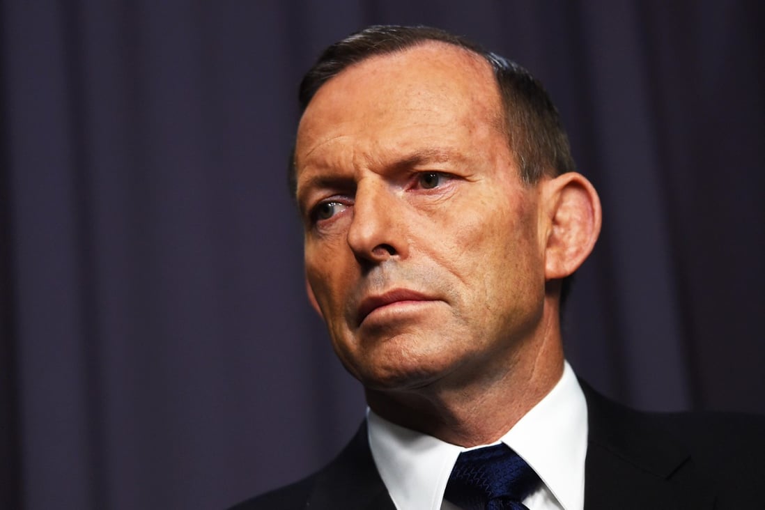 Foreign investors who illegally buy houses in Australia face hefty fines and prison terms of up to three years, PM Tony Abbott said. Photo: AP