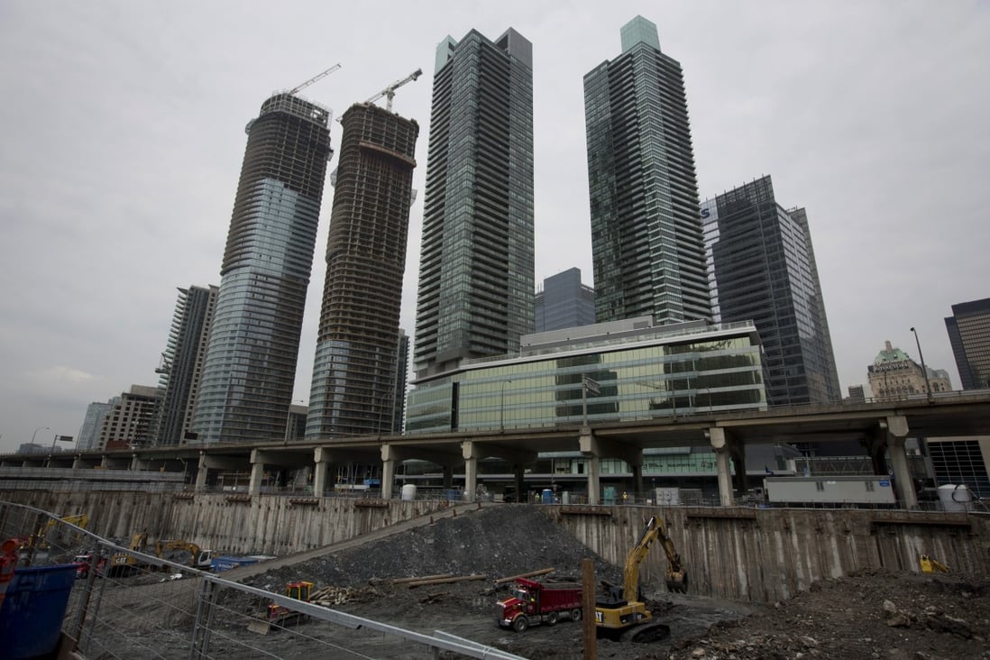 The Canada Mortgage and Housing Corp says the market is perhaps 3 to 4 per cent overvalued, below the 8 per cent considered a problem. Photo: Bloomberg
