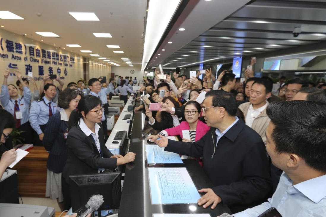 Premier Li Keqiang says he was told during a trip to Fujian that Taiwanese merchants were not getting enough protection for their intellectual property rights. Photo: Xinhua