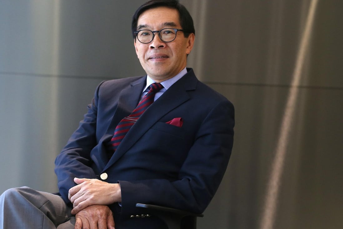 SFC chairman Carson Tong says cross-border regulation will ensure  a smooth launch of the Shenzhen-Hong Kong Stock Connect scheme later in the year. Photo: David Wong