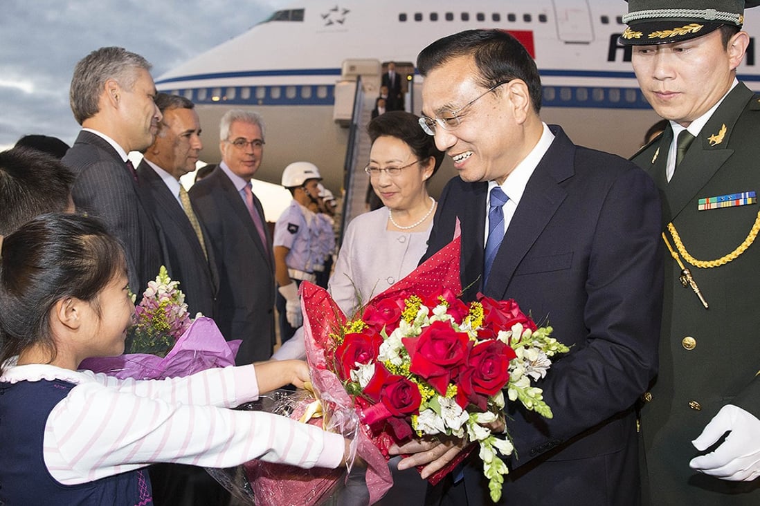 Chinese Premier Li Keqiang and his wife Cheng Hong arrive in Brasilia. Photo: Xinhua