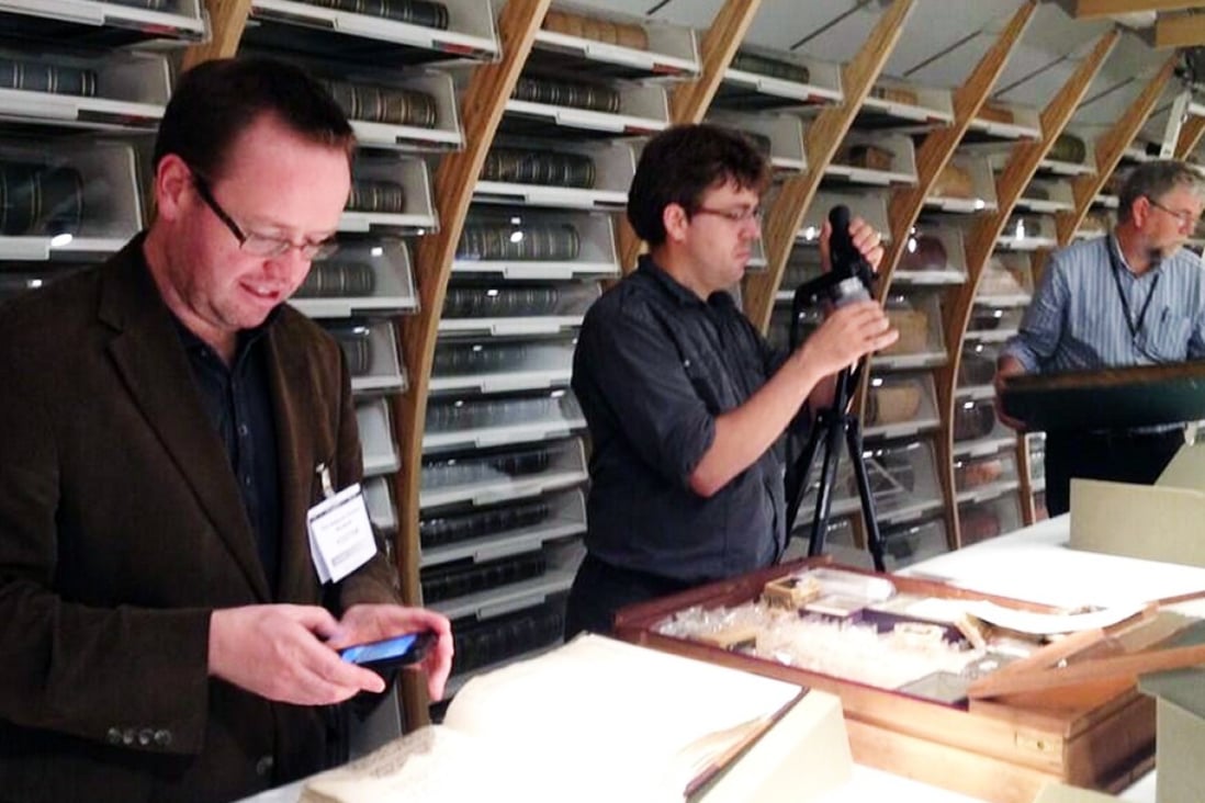 Richard Coulton (left) is researching real C17-18 tea in the Sloane Herbarium with Charlie Jarvis (centre). Photo: SCMP Pictures
