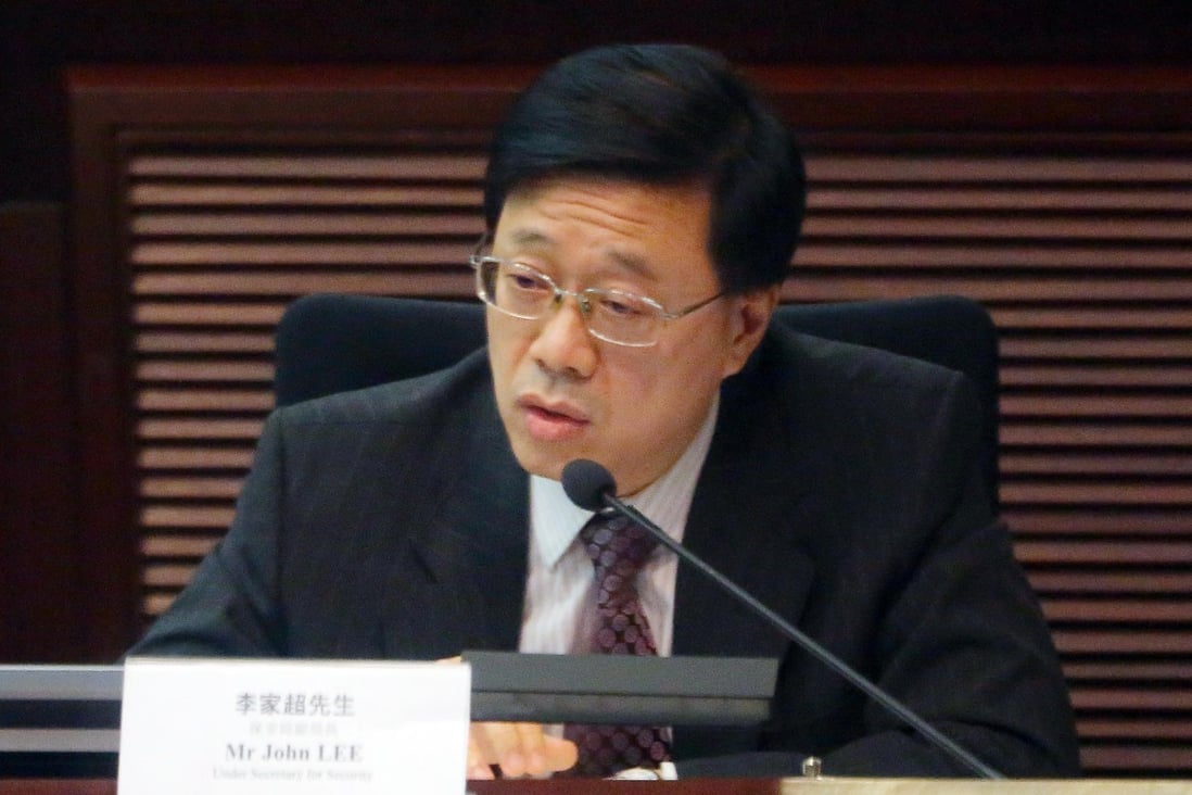 John Lee explains the law to legislators. Photo: SCMP Pictures