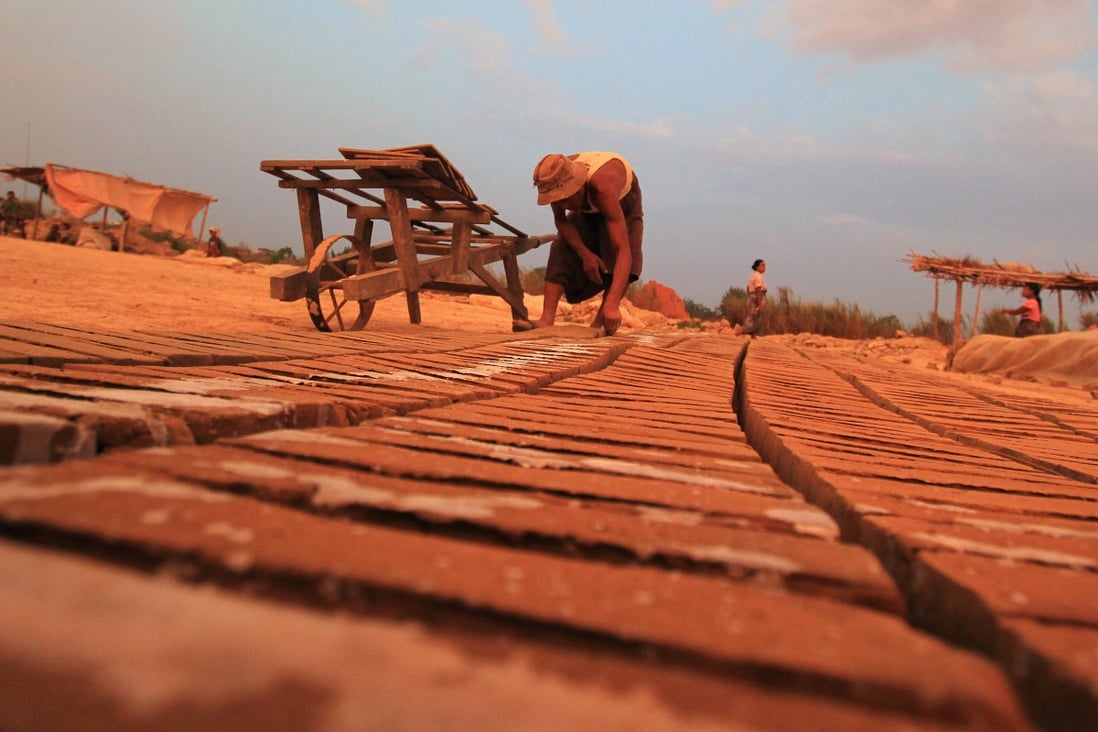 Labourers work at a brick factory in Myanmar. Photo: AFP