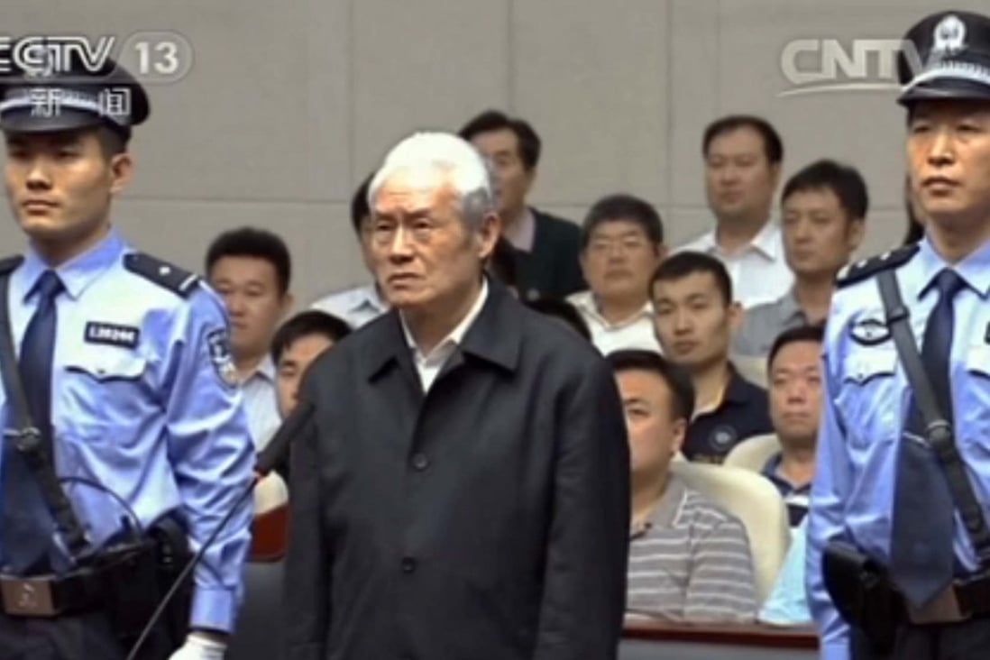A white-haired Zhou Yongkang admits his guilt in court and says that he will not appeal. Photo: CCTV