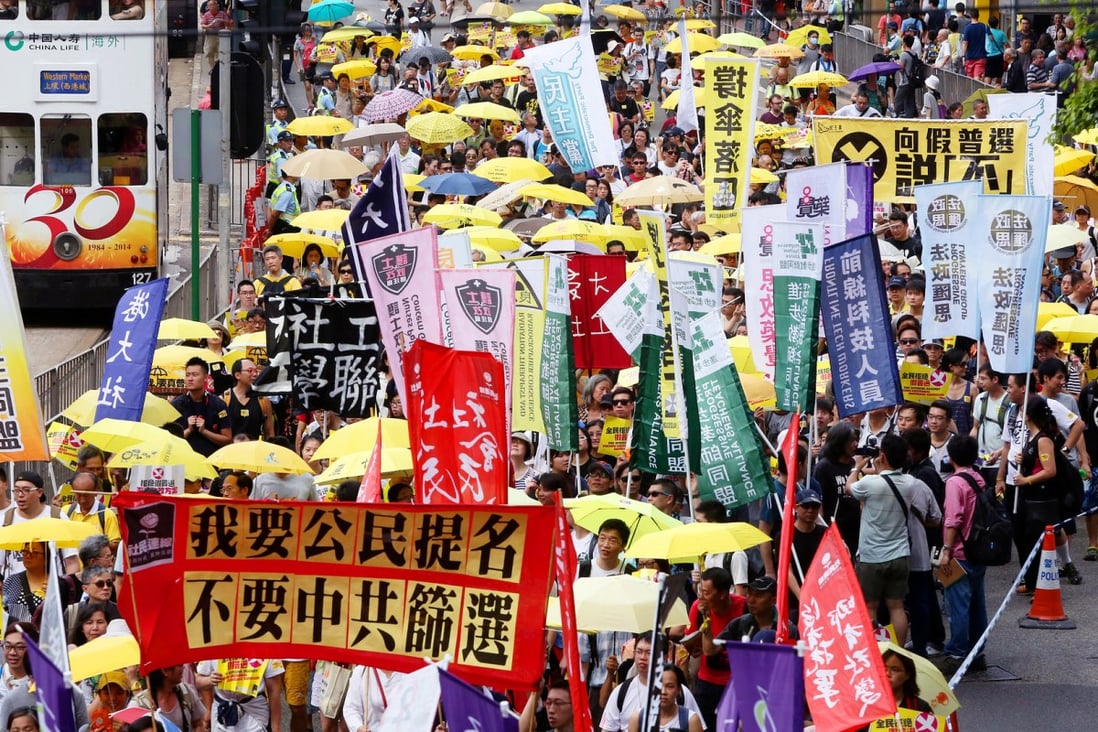 Protesters who are against the reform proposal march to Admiralty. Photo: Sam Tsang