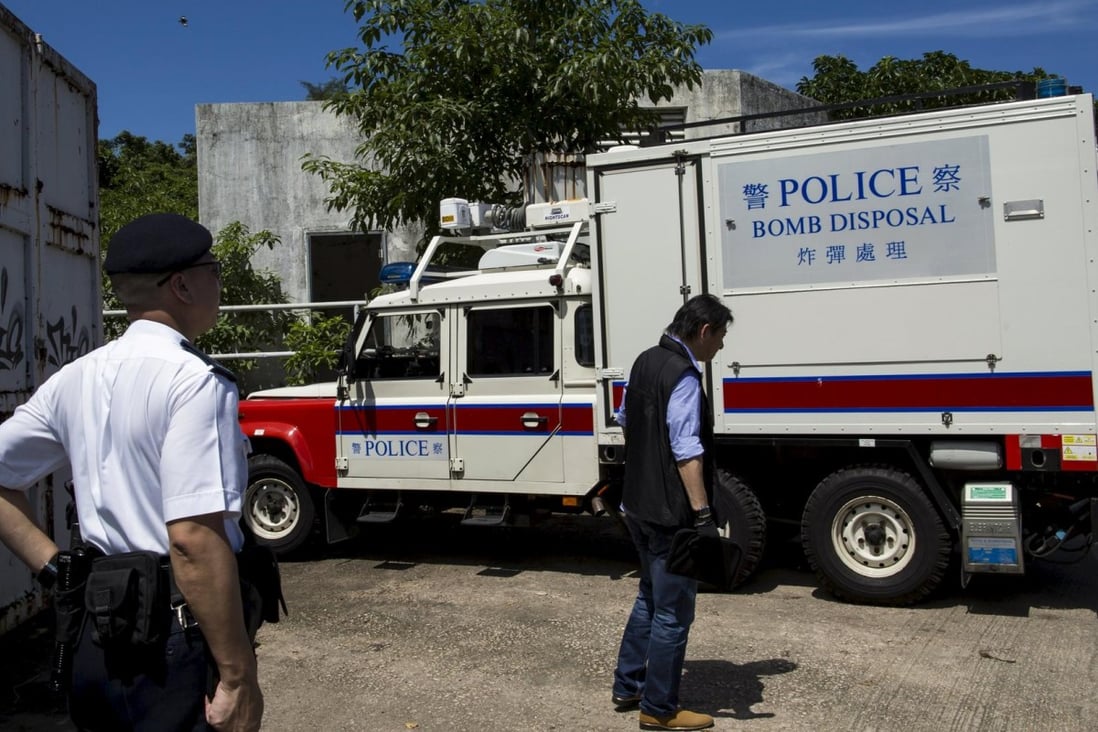 A police bomb disposal vehicle enters the former ATV studio where explosives were seized. Photo: Reuters