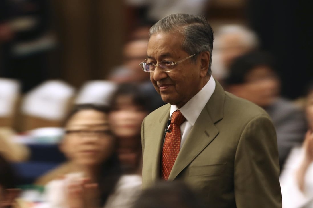 Mahathir Mohamad, at the International Conference on The Future of Asia, in Tokyo, in May. Photos: AP; AFP; Reuters