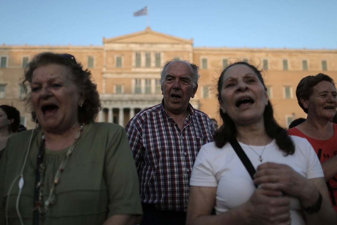 Protesters in Athens take part in a rally against austerity. Photo: EPA