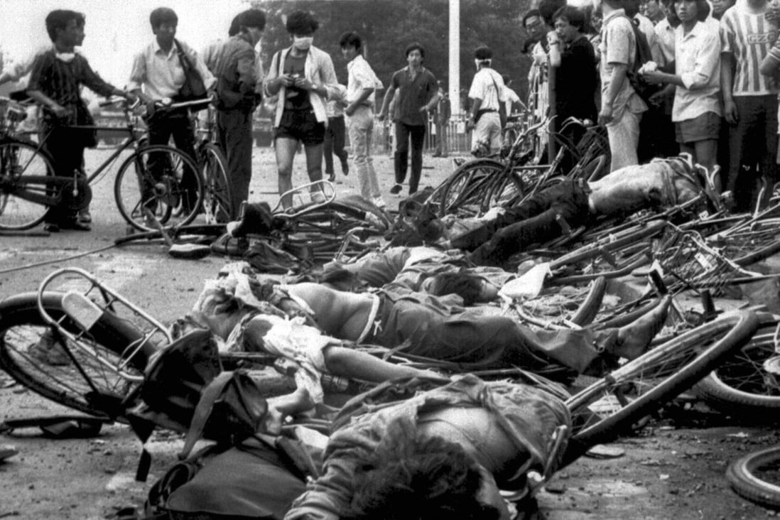 Bodies lie among mangled bicycles near Tiananmen Square in this file photo from the aftermath of the 1989 protests. Twenty-six years after the bloody crackdown in which an unknown number died, the Chinese government's web of silence remains. The precise number of victims is unknown, their names and stories largely untold. Photo: AP