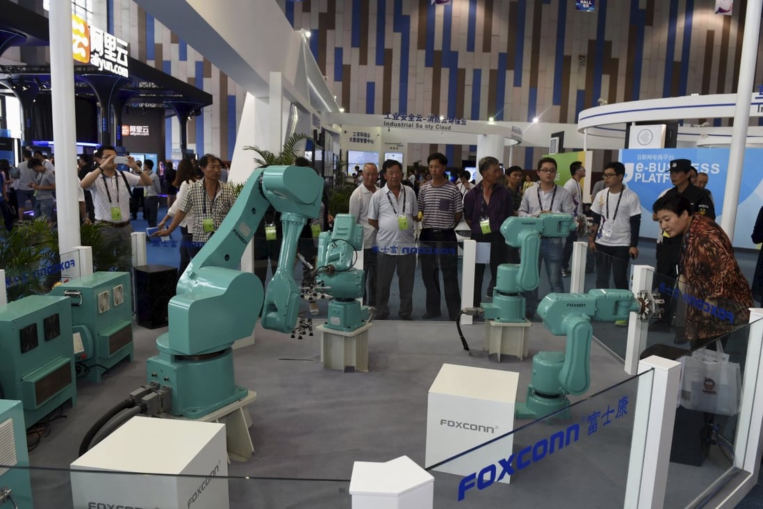 Foxconn wants industrial robots, including its Foxbots, to comprise nearly one-third of its work force within five years. Photo: Reuters