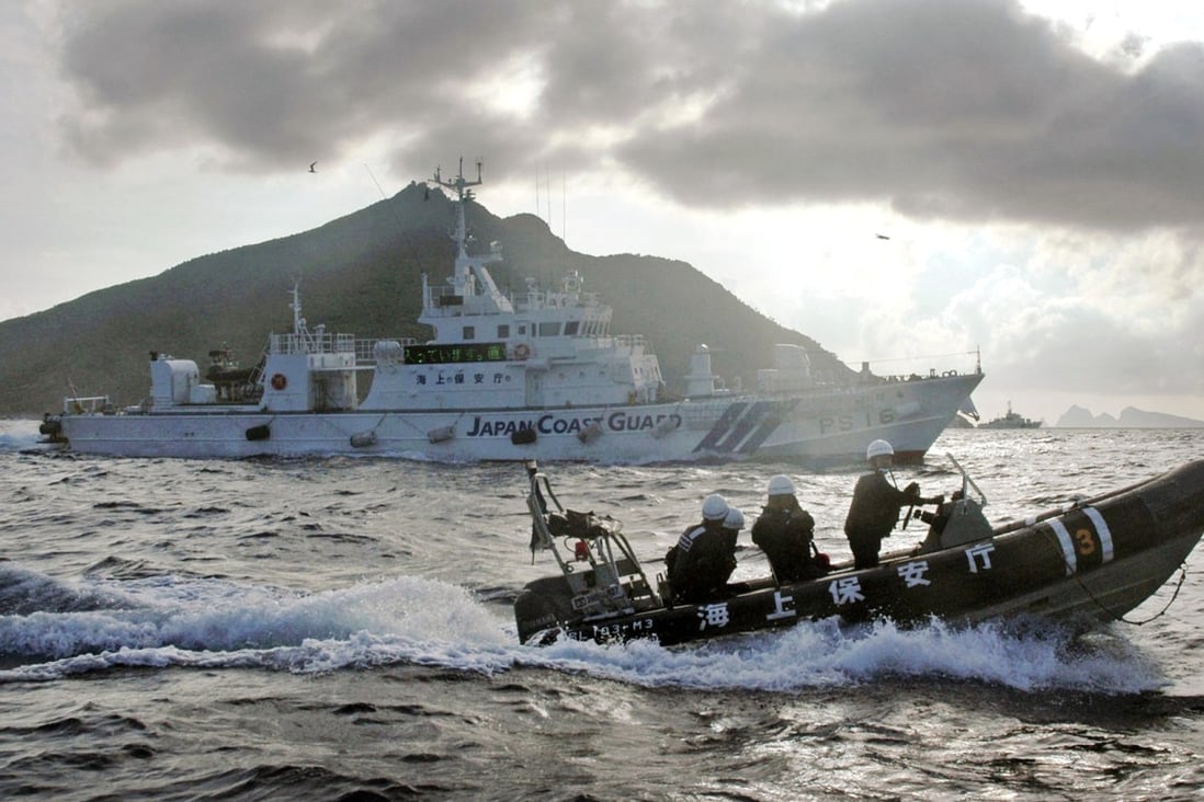Japanese coastguard boats sail near the Diaoyu Islands. Photo: AP