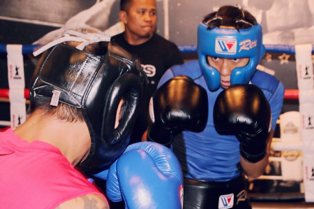 Hong Kong boxer Rex Tso (in blue) sparring at DEF gym in Sheung Wan. Photos: Unus Alladin