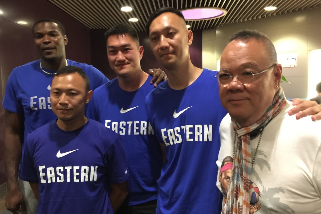 From left: Eastern's Chris Barnes, Heung Chun-keung (both players) coach Tam Wai-Yeung , Assistant director Lee Wai-Lin, director Peter Leung Shou-chi.

