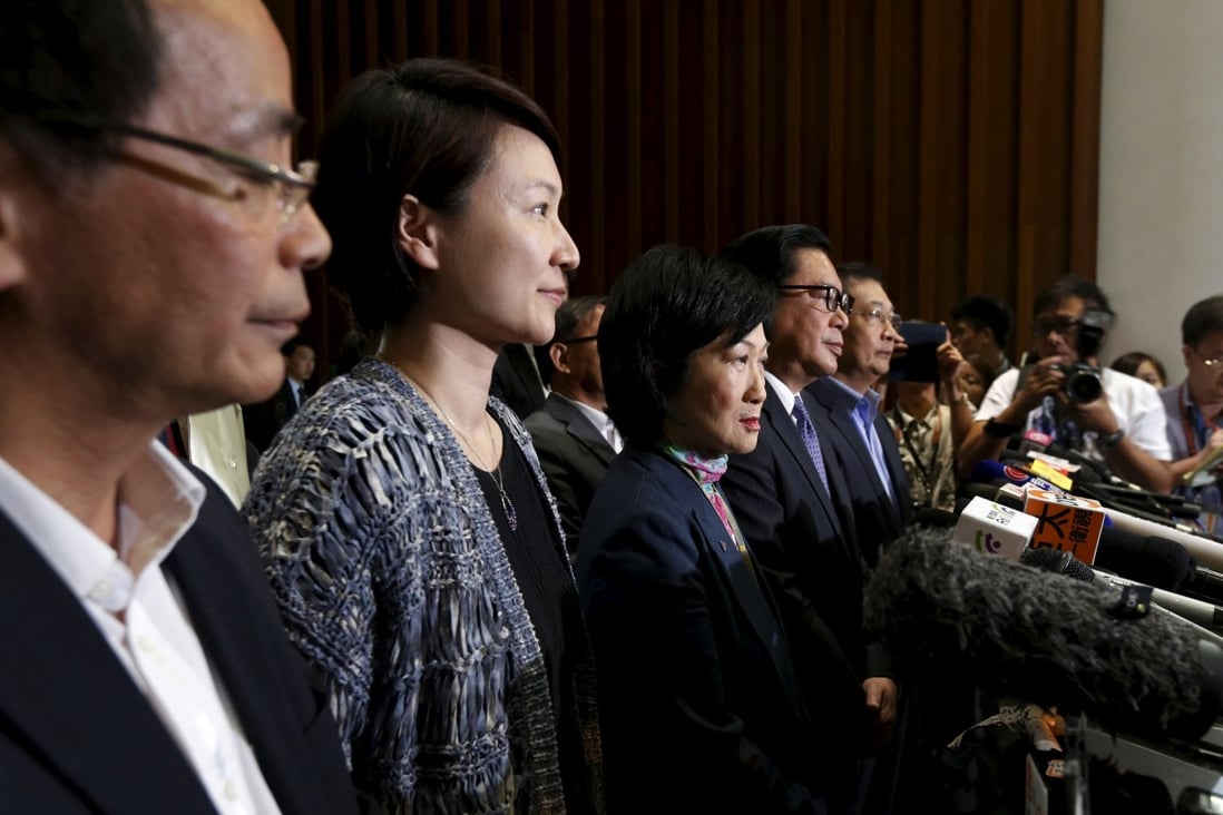 Pro-establishment lawmakers meet the press after the walkout fiasco during the Legislative Council reform vote. Photo: Reuters