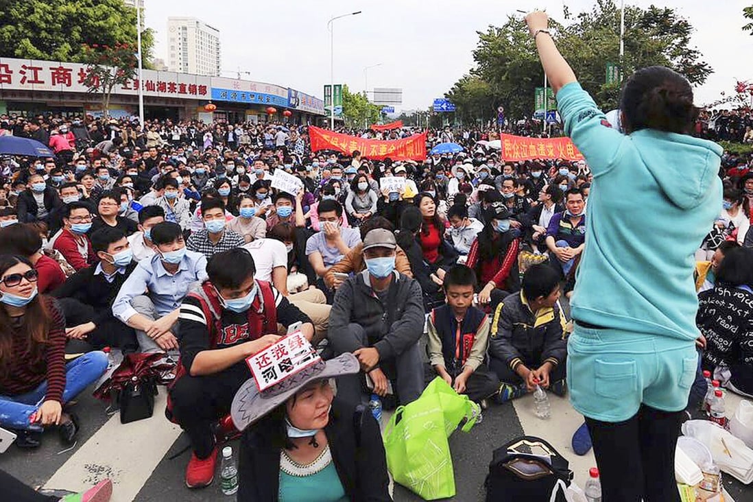 Protesters in Heyuan oppose the planned expansion of the power plant in April. Calm has returned but residents say they are ready to march again. Photo: SCMP Pictures