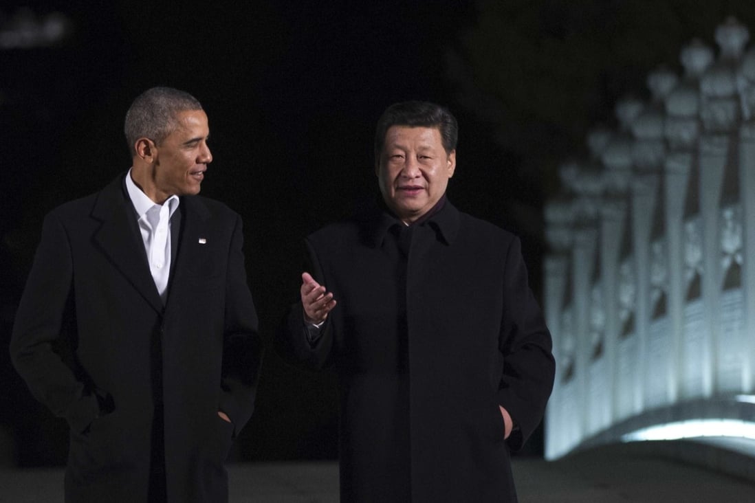 A file picture of Barack Obama and Xi Jinping taken during an Apec meeting in Beijing last November. Photo: AFP