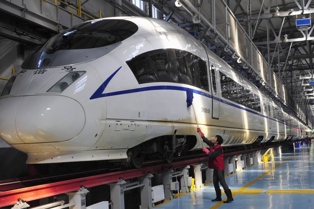 A high speed bullet train is inspected in China as CRRC Corp, the merged entity of the country’s two largest train makers, announces recent contracts worth 12.2 billion yuan (HK$15 billion). Photo: Reuters