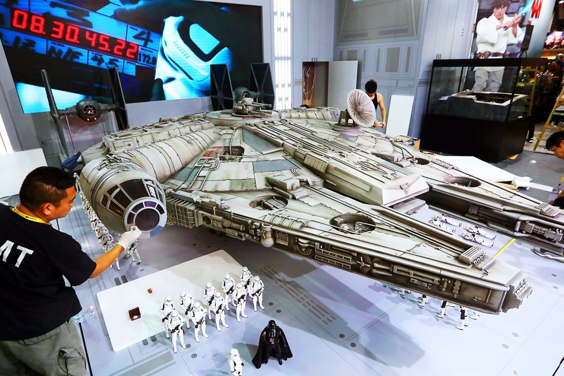 It is 5.5 metres long, 3.7 metres wide and 1.22 metres tall and weighs a tonne – at a scale of 1:6 compared with the spaceship that has appeared in several Star Wars films since the first, in 1977, and will feature again in the upcoming Star Wars: The Force Awakens. Photo: Nora Tam