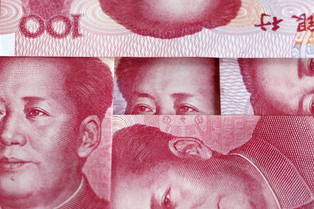 Yuan bank notes are shown as Beijing widened the trading band of the currency without setting a timeframe. Photo: EPA