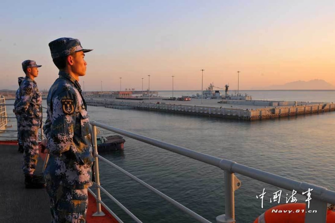 China's first aircraft carrier, the Liaoning, docked for the first time at the Sanya complex on November 29, 2013. Photo: Xinhua