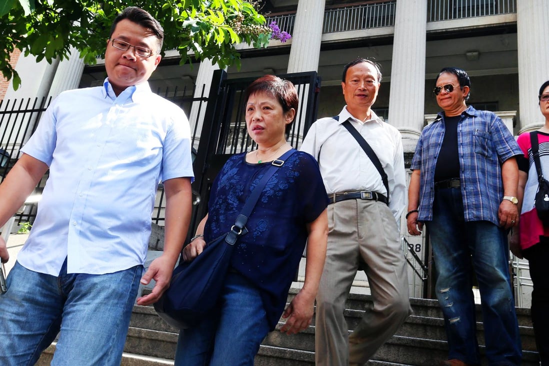 Kwai Tsing district councillor Andrew Wan (left) and Mayfair Gardens' residents try to protect their homes. Photo: K.Y. Cheng