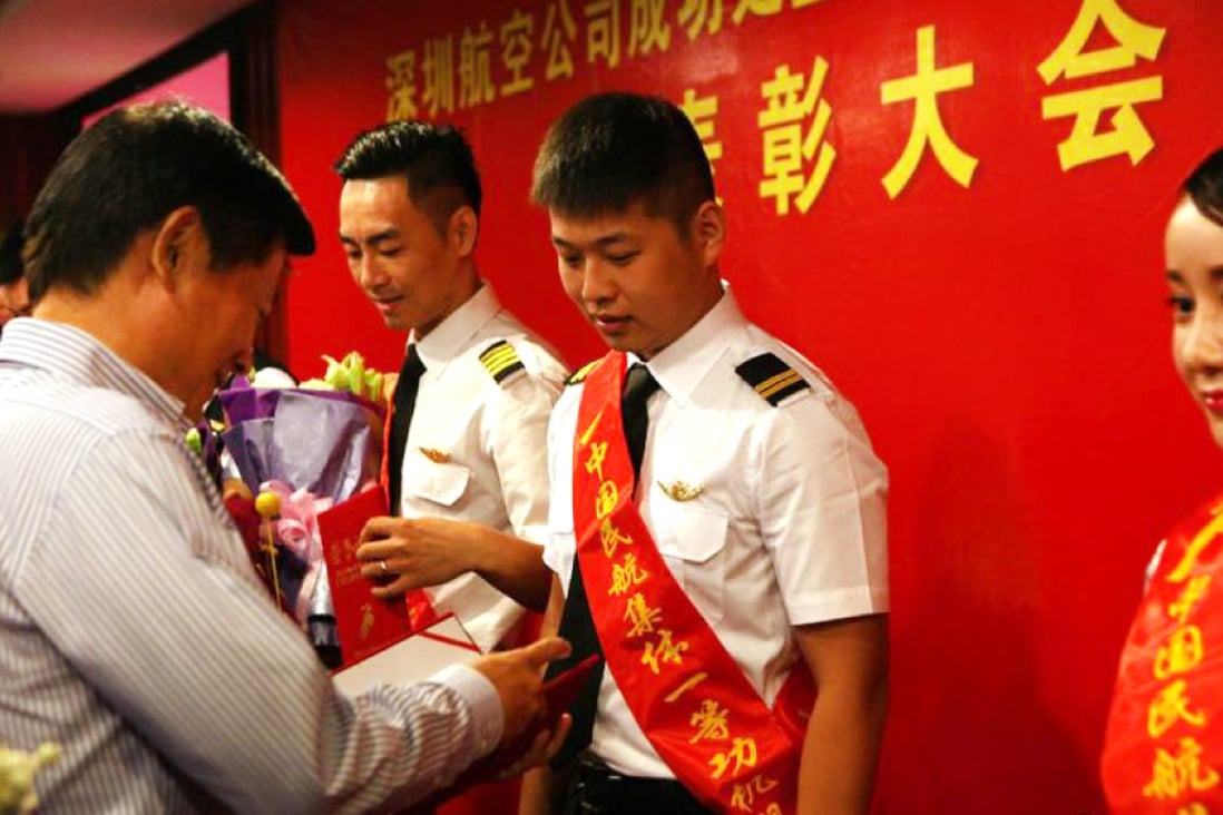 The Shenzhen Airlines crew are honoured for bravery on  Wednesday. Photo: SCMP Pictures