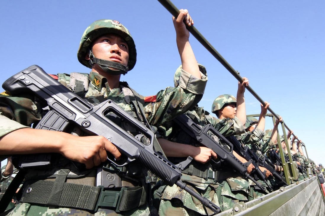 Security forces taking part in an anti-terrorism drill in Xinjiang two years ago. China says Islamist militants from the region pose a threat beyond its borders. Photo: AFP