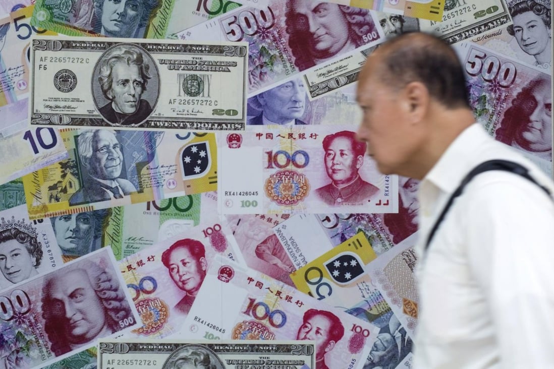 After its sharp depreciation this week, China's yuan currency is expected to face more downward pressure but will not drop sharply. Photo: Reuters