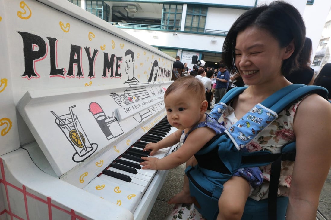 Nine-month-old Cheung Lok-yan and her mother attend the "Play Me, I'm Yours" launch event at PMQ in Central. Photo: David Wong