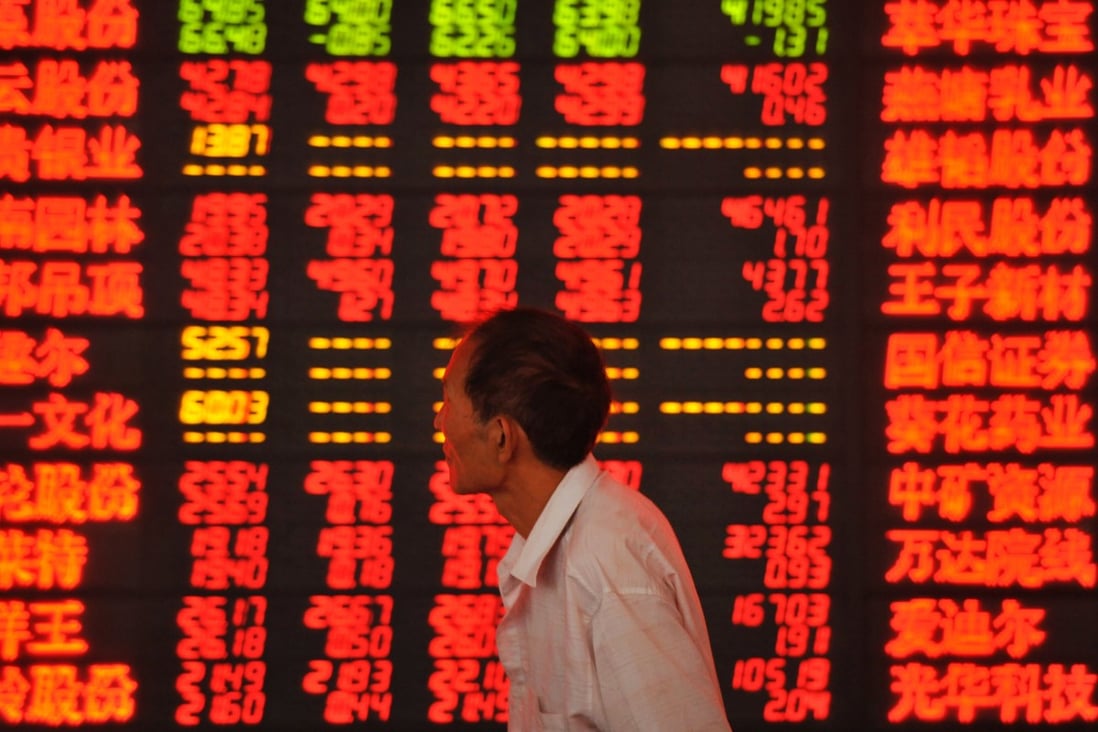 The share market rally in the first six months of the year drove merger and acquisition activity in China. Photo: AFP  