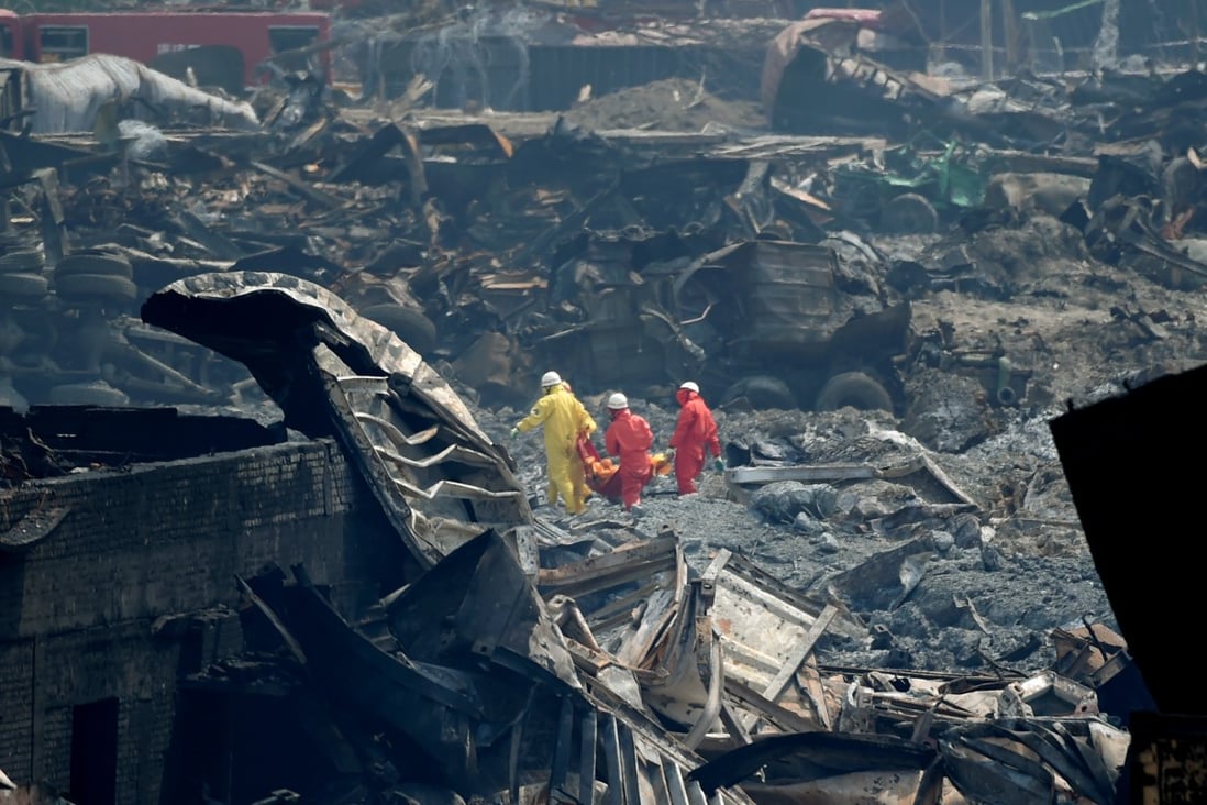 Rescuers work at the core blast site in Tianjin on Saturday. Photo: Xinhua