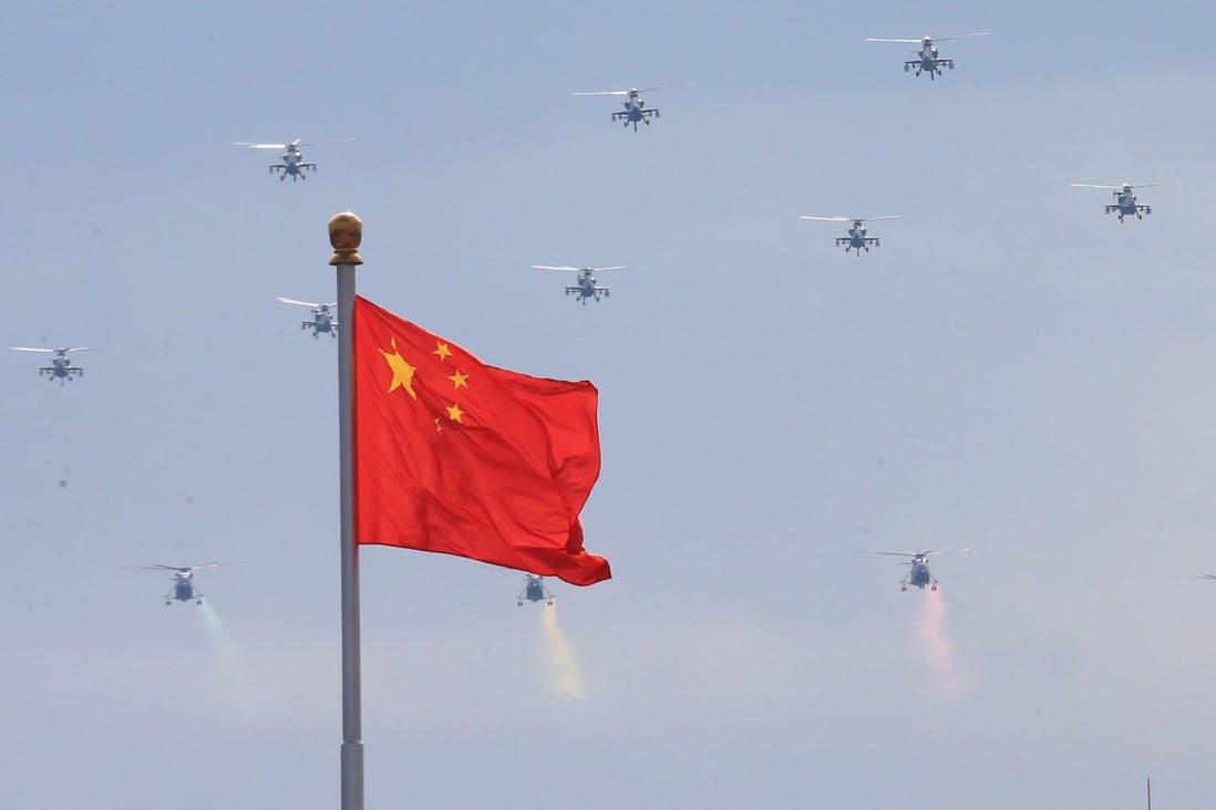 PLA helicopters fly over Beijing on Sunday during the rehearsal for the September 3 military parade marking the 70th anniversary of Japan's surrender. Photo: Xinhua