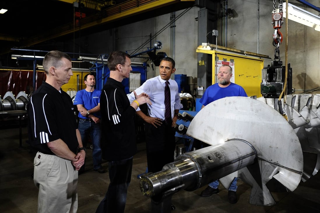 US President Barack Obama at a tour of a factory in Iowa. Photo: AFP 