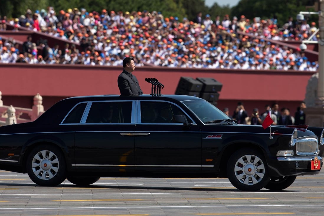 President Xi Jinping stands in a Chinese-made Hongqi Red Flag limousine while on his way to inspect troops during a military parade at Tiananmen Square in Beijing on Thursday. Photo: AFP