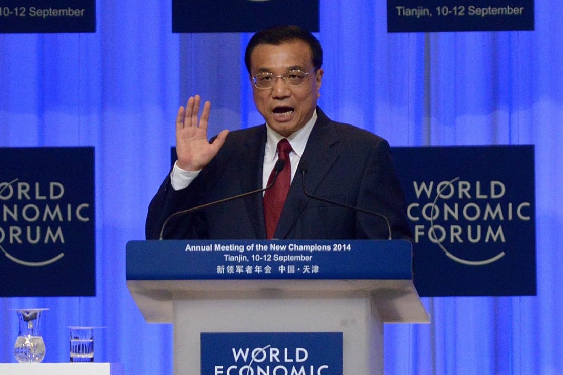 Chinese premier Li Keqiang speaks at the 2014 World Economic Forum summit in Dalian, China. Photo: AFP