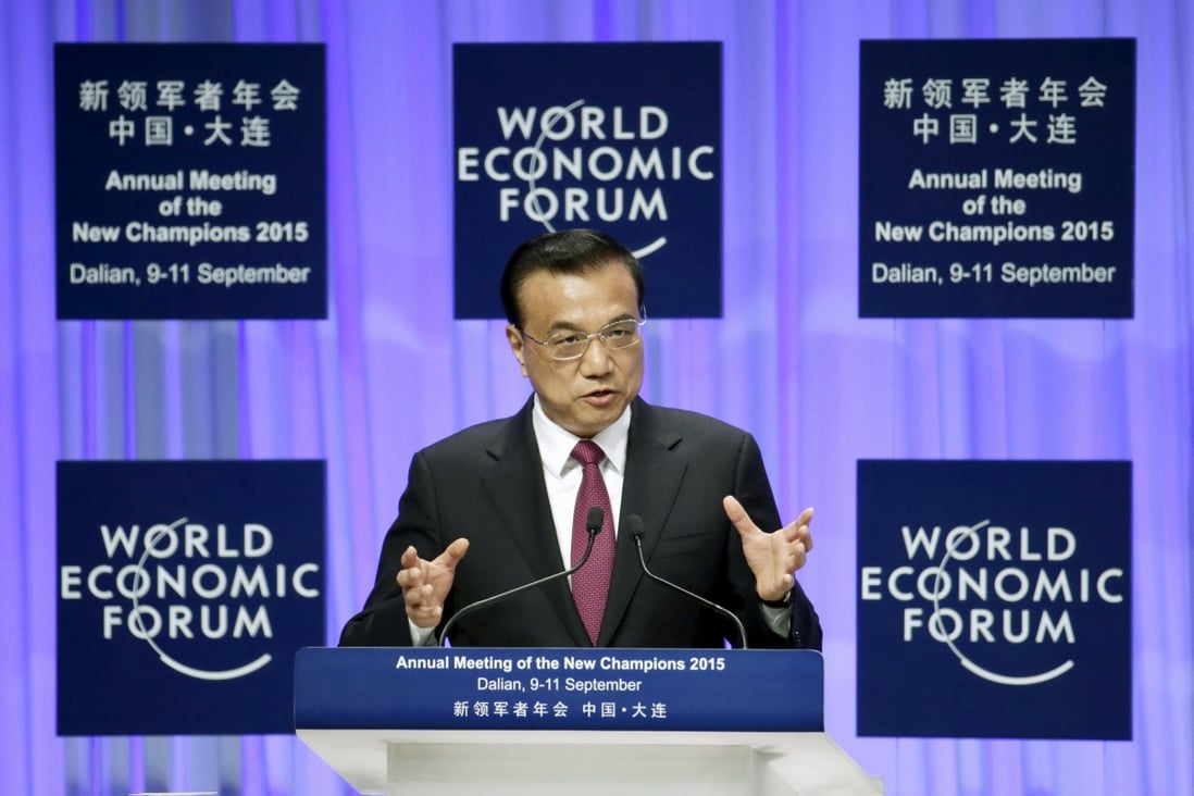 Premier Li Keqiang delivers a speech at the opening ceremony of the World Economic Forum in Dalian. Photo: Reuters