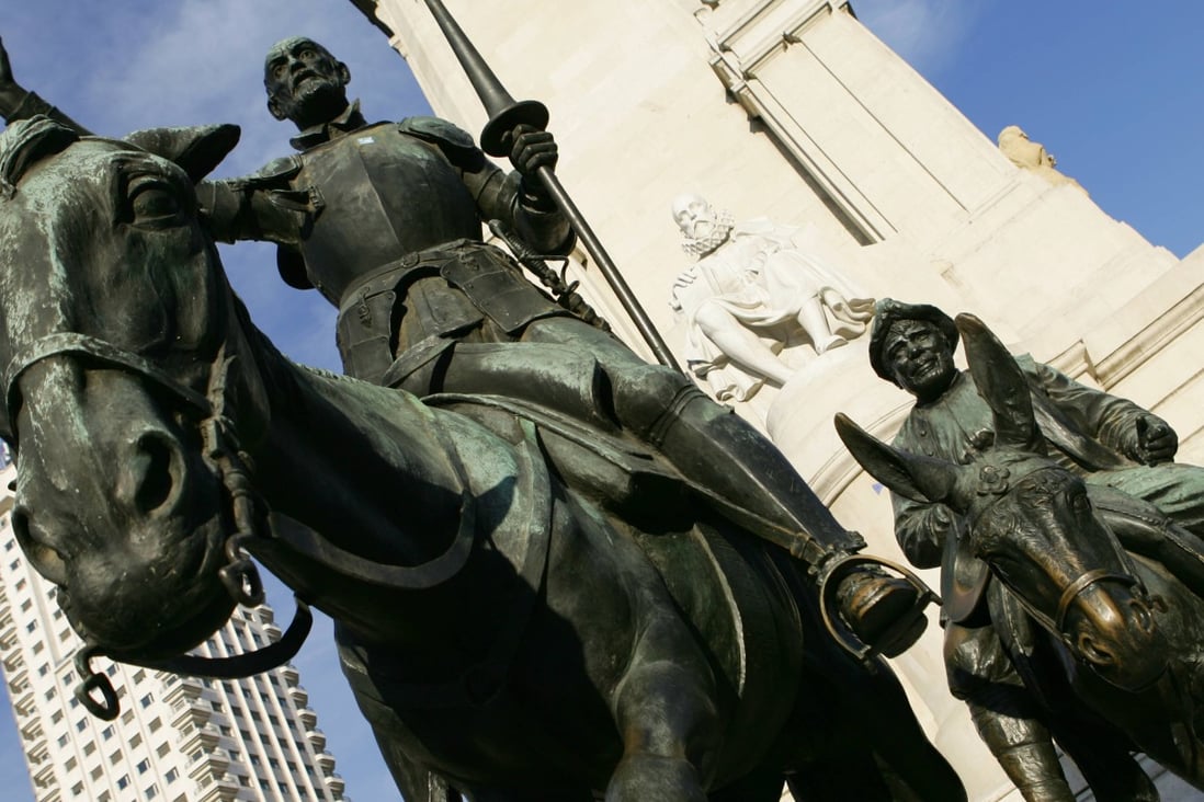Don Quixote and his man Sancho Panza captured in bronze in Madrid's central square. Photo: AFP