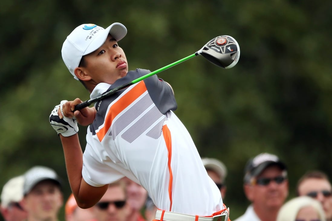 Guan Tianlang tees off during the final round of the 2013 Masters in Augusta. Photo: AFP