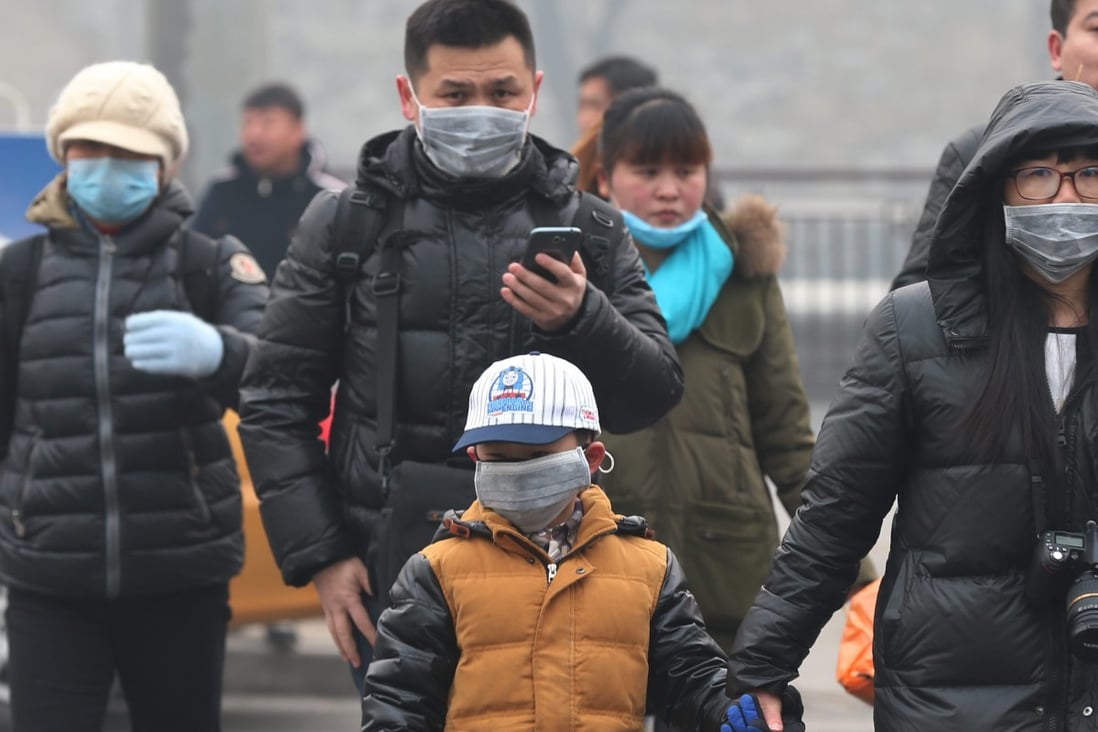 People in Beijing and many other cities in northern China are back wearing face masks following the return of thick smog. File photo: EPA