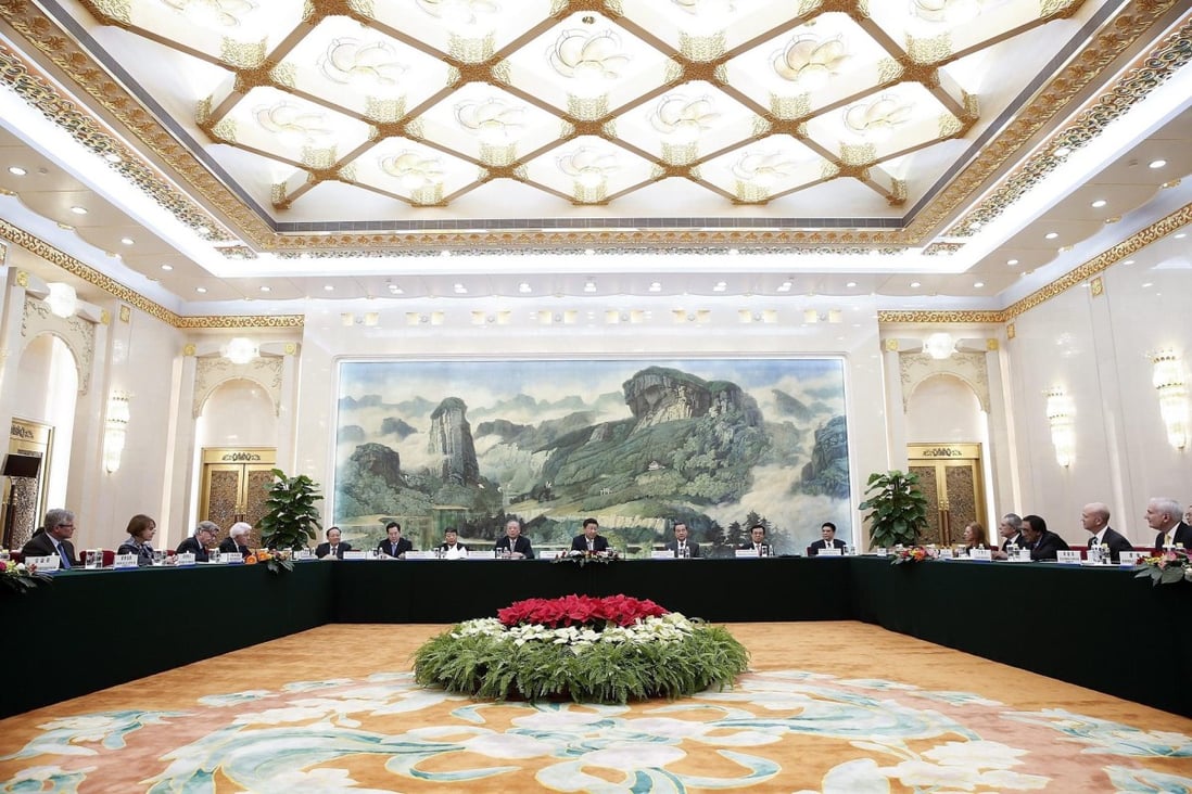 Xi Jinping (centre) presides over a meeting with US business leaders in Beijing.Photo: EPA
