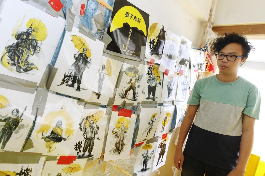 Sampson Wong Yu-hin, one of the organisers of the exhibition of Occupy objects, with some of the exhibits.Photo: Franke Tsang