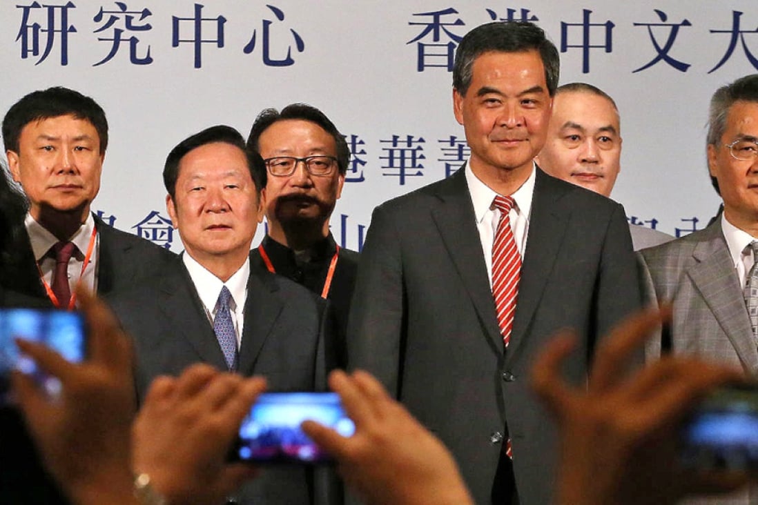 Chen Zuoer (centre), with forum attendees including Chief Executive Leung Chun-ying (right). Photo: Felix Wong