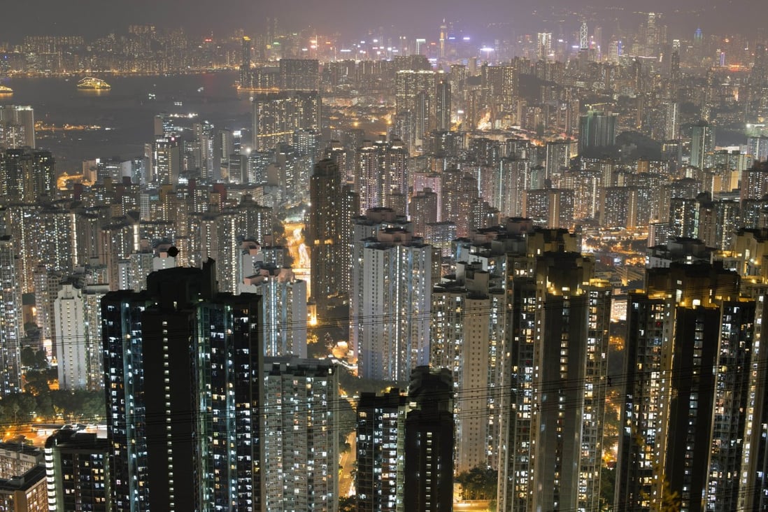Hong Kong apartment buildings in the city's Kowloon district as secondary how owners slash prices to spur sales in a weakening market. Photo: AFP