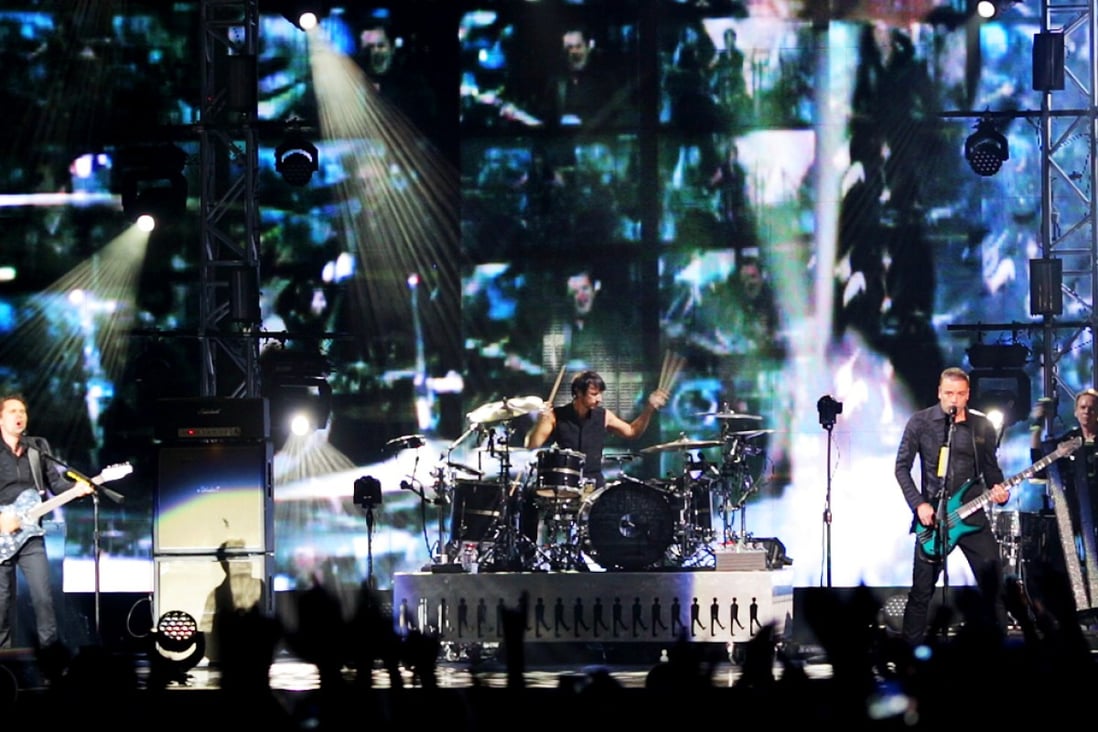 British rock trio Muse make welcome return to Hong Kong with explosive show | China Morning Post